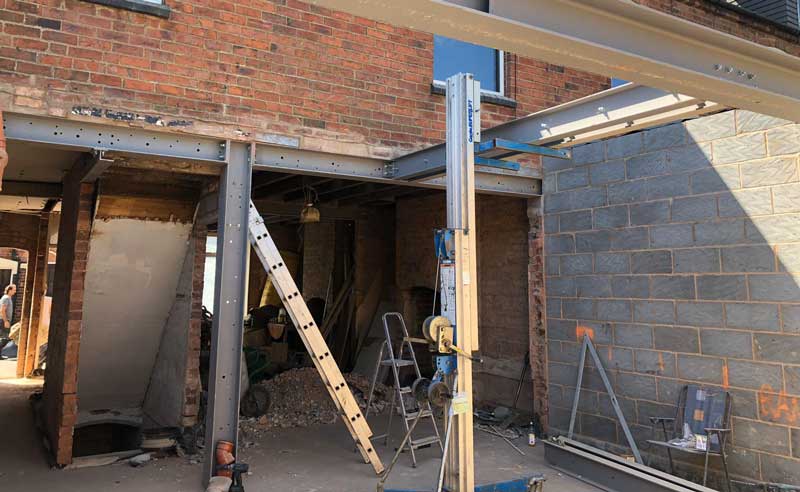 On-site beam welding in London on structural steel frame